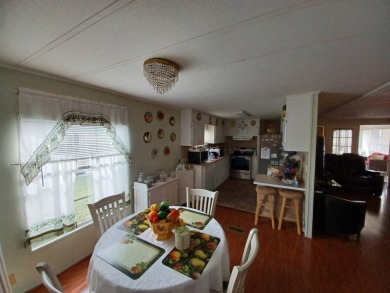 Come settle down in a beautiful manufactured home with about 1 on Fairways Country Club in Florida - for sale on GolfHomes.com, golf home, golf lot