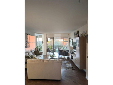 Live in elegance in this beautifully remodeled home in a gated on Inverrary Country Club in Florida - for sale on GolfHomes.com, golf home, golf lot