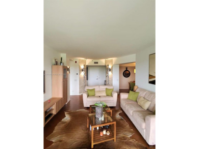 Live in elegance in this beautifully remodeled home in a gated on Inverrary Country Club in Florida - for sale on GolfHomes.com, golf home, golf lot