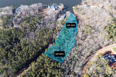 This exceptional waterfront property on Lake Tillery offers on The Tillery Tradition Country Club in North Carolina - for sale on GolfHomes.com, golf home, golf lot