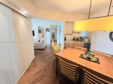 Live in elegance in this beautifully remodeled home in a gated on Inverrary Country Club in Florida - for sale on GolfHomes.com, golf home, golf lot