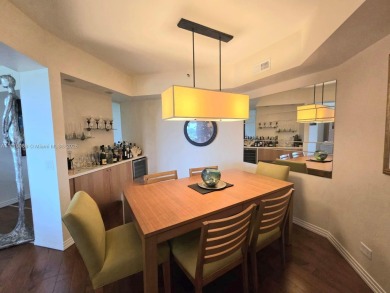 Live in elegance in this beautifully remodeled home in a gated on Inverrary Country Club in Florida - for sale on GolfHomes.com, golf home, golf lot