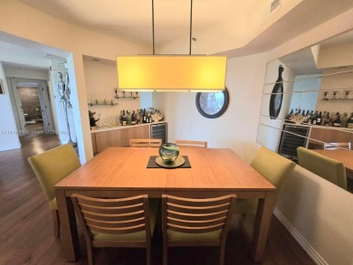 Live in elegance in this beautifully remodeled home in a gated on Inverrary Country Club in Florida - for sale on GolfHomes.com, golf home, golf lot
