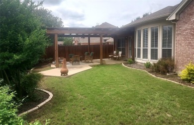 Stylish 1-story David Weekly home located in a CUL-DE-SAC boasts on The Golf Club at Fossil Creek in Texas - for sale on GolfHomes.com, golf home, golf lot