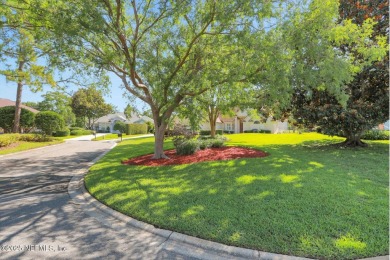 ''Sandwedged'' between the 11th and 12th holes, this Country on Jacksonville Golf and Country Club in Florida - for sale on GolfHomes.com, golf home, golf lot