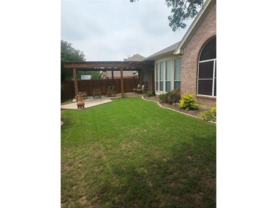 Stylish 1-story David Weekly home located in a CUL-DE-SAC boasts on The Golf Club at Fossil Creek in Texas - for sale on GolfHomes.com, golf home, golf lot