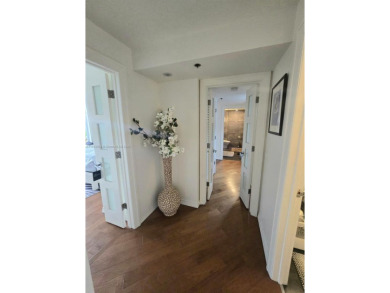 Live in elegance in this beautifully remodeled home in a gated on Inverrary Country Club in Florida - for sale on GolfHomes.com, golf home, golf lot