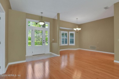 ''Sandwedged'' between the 11th and 12th holes, this Country on Jacksonville Golf and Country Club in Florida - for sale on GolfHomes.com, golf home, golf lot
