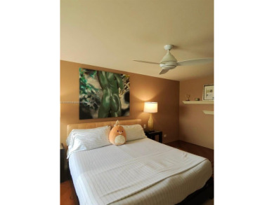 Live in elegance in this beautifully remodeled home in a gated on Inverrary Country Club in Florida - for sale on GolfHomes.com, golf home, golf lot