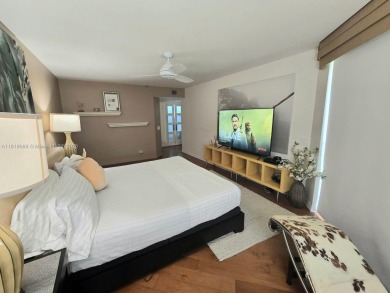 Live in elegance in this beautifully remodeled home in a gated on Inverrary Country Club in Florida - for sale on GolfHomes.com, golf home, golf lot
