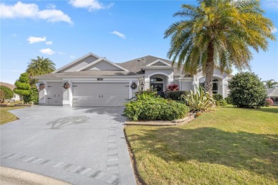 Welcome to this exquisite 3-bedroom, 2-bath Fern designer model on Egret Championship Golf Course in Florida - for sale on GolfHomes.com, golf home, golf lot