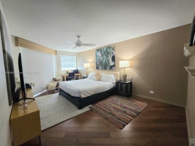 Live in elegance in this beautifully remodeled home in a gated on Inverrary Country Club in Florida - for sale on GolfHomes.com, golf home, golf lot