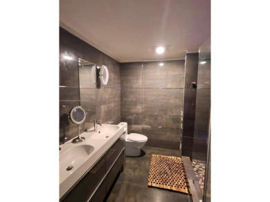 Live in elegance in this beautifully remodeled home in a gated on Inverrary Country Club in Florida - for sale on GolfHomes.com, golf home, golf lot