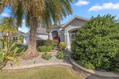 Welcome to this exquisite 3-bedroom, 2-bath Fern designer model on Egret Championship Golf Course in Florida - for sale on GolfHomes.com, golf home, golf lot