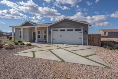 Nestled in one of the area's most convenient locations just 2 on Cerbat Cliffs Golf Course in Arizona - for sale on GolfHomes.com, golf home, golf lot