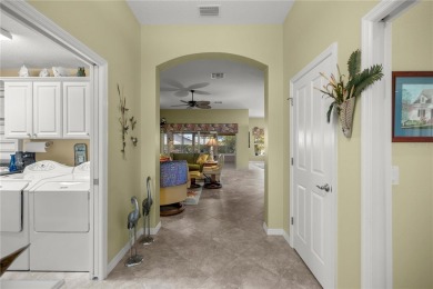 Welcome to this exquisite 3-bedroom, 2-bath Fern designer model on Egret Championship Golf Course in Florida - for sale on GolfHomes.com, golf home, golf lot