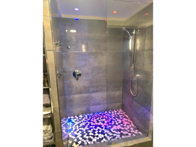 Live in elegance in this beautifully remodeled home in a gated on Inverrary Country Club in Florida - for sale on GolfHomes.com, golf home, golf lot