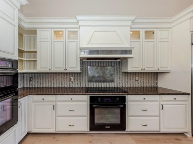 One or more photo(s) has been virtually staged. Waterfront on Bird Bay Executive Golf Club in Florida - for sale on GolfHomes.com, golf home, golf lot