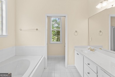 Experience the ultimate blend of comfort and scenic beauty at on The Club at Shoal Creek Golf Course in Georgia - for sale on GolfHomes.com, golf home, golf lot