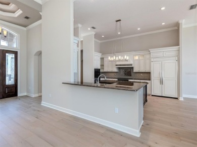 One or more photo(s) has been virtually staged. Waterfront on Bird Bay Executive Golf Club in Florida - for sale on GolfHomes.com, golf home, golf lot
