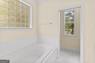 Experience the ultimate blend of comfort and scenic beauty at on The Club at Shoal Creek Golf Course in Georgia - for sale on GolfHomes.com, golf home, golf lot