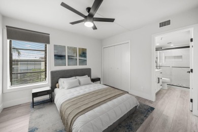 Step into luxury in this fully remodeled 2-bed, 2-bath corner on Marina Lakes Golf Course in Florida - for sale on GolfHomes.com, golf home, golf lot