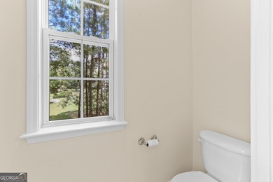 Experience the ultimate blend of comfort and scenic beauty at on The Club at Shoal Creek Golf Course in Georgia - for sale on GolfHomes.com, golf home, golf lot