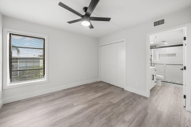 Step into luxury in this fully remodeled 2-bed, 2-bath corner on Marina Lakes Golf Course in Florida - for sale on GolfHomes.com, golf home, golf lot