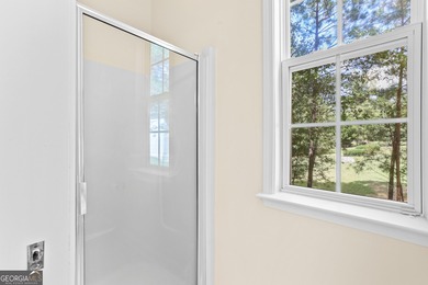 Experience the ultimate blend of comfort and scenic beauty at on The Club at Shoal Creek Golf Course in Georgia - for sale on GolfHomes.com, golf home, golf lot