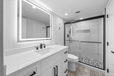 Step into luxury in this fully remodeled 2-bed, 2-bath corner on Marina Lakes Golf Course in Florida - for sale on GolfHomes.com, golf home, golf lot