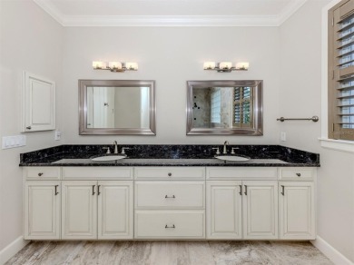 One or more photo(s) has been virtually staged. Waterfront on Bird Bay Executive Golf Club in Florida - for sale on GolfHomes.com, golf home, golf lot
