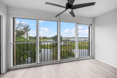 Step into luxury in this fully remodeled 2-bed, 2-bath corner on Marina Lakes Golf Course in Florida - for sale on GolfHomes.com, golf home, golf lot
