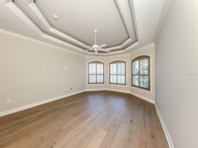 One or more photo(s) has been virtually staged. Waterfront on Bird Bay Executive Golf Club in Florida - for sale on GolfHomes.com, golf home, golf lot