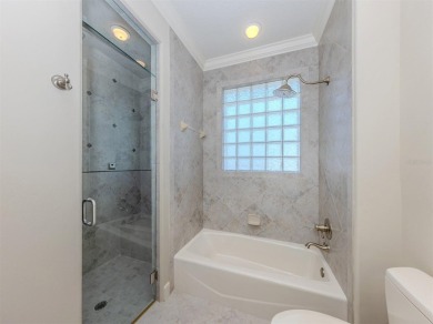 One or more photo(s) has been virtually staged. Waterfront on Bird Bay Executive Golf Club in Florida - for sale on GolfHomes.com, golf home, golf lot