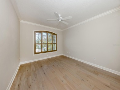 One or more photo(s) has been virtually staged. Waterfront on Bird Bay Executive Golf Club in Florida - for sale on GolfHomes.com, golf home, golf lot