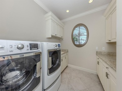 One or more photo(s) has been virtually staged. Waterfront on Bird Bay Executive Golf Club in Florida - for sale on GolfHomes.com, golf home, golf lot
