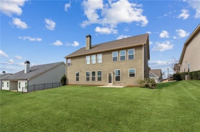 This stunning two-story home, featuring 5 bedrooms and 3 on Traditions of Braselton Golf Club in Georgia - for sale on GolfHomes.com, golf home, golf lot