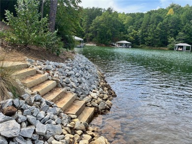 Welcome to this lakefront, newly-built custom home in the lovely on Keowee Key Golf and Country Club in South Carolina - for sale on GolfHomes.com, golf home, golf lot