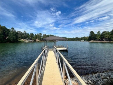 Welcome to this lakefront, newly-built custom home in the lovely on Keowee Key Golf and Country Club in South Carolina - for sale on GolfHomes.com, golf home, golf lot