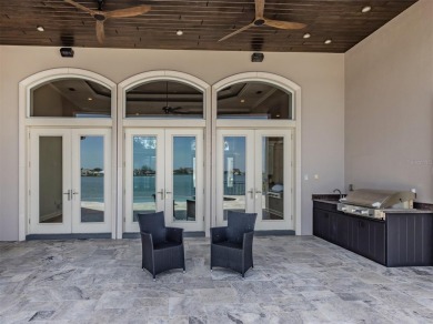 One or more photo(s) has been virtually staged. Waterfront on Bird Bay Executive Golf Club in Florida - for sale on GolfHomes.com, golf home, golf lot