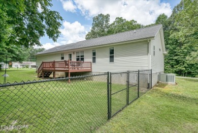 Adorable, well maintained home on a corner lot in quiet part of on Lake Tansi Village Country Club in Tennessee - for sale on GolfHomes.com, golf home, golf lot