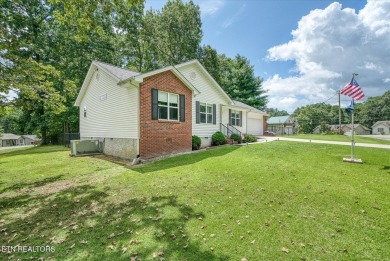 Adorable, well maintained home on a corner lot in quiet part of on Lake Tansi Village Country Club in Tennessee - for sale on GolfHomes.com, golf home, golf lot