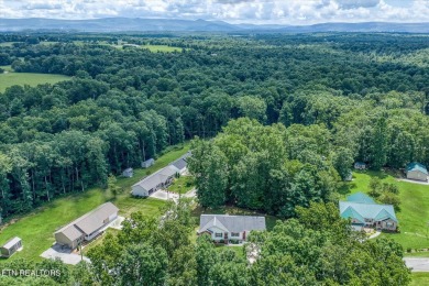 Adorable, well maintained home on a corner lot in quiet part of on Lake Tansi Village Country Club in Tennessee - for sale on GolfHomes.com, golf home, golf lot