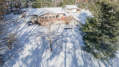 Spacious 3-Bedroom Home with Bonus Spaces and Ample Storage Near on Northern Bay Golf Resort and Marina in Wisconsin - for sale on GolfHomes.com, golf home, golf lot