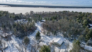 Spacious 3-Bedroom Home with Bonus Spaces and Ample Storage Near on Northern Bay Golf Resort and Marina in Wisconsin - for sale on GolfHomes.com, golf home, golf lot