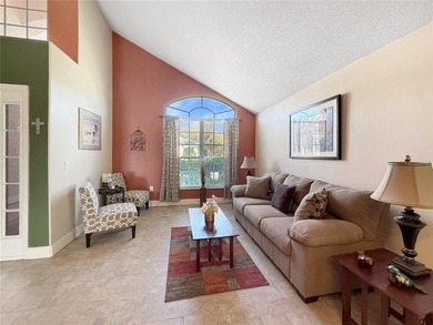 Welcome to this beautiful two-story home nestled inside the on Oaks National Golf Course in Florida - for sale on GolfHomes.com, golf home, golf lot