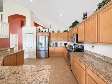 Welcome to this beautiful two-story home nestled inside the on Oaks National Golf Course in Florida - for sale on GolfHomes.com, golf home, golf lot