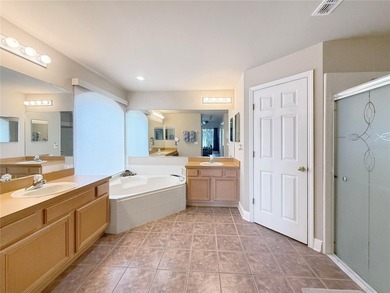 Welcome to this beautiful two-story home nestled inside the on Oaks National Golf Course in Florida - for sale on GolfHomes.com, golf home, golf lot