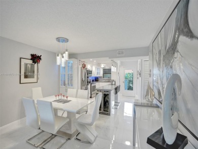 This beautifully renovated 2-bedroom unit is fully furnished and on Inverrary Country Club in Florida - for sale on GolfHomes.com, golf home, golf lot