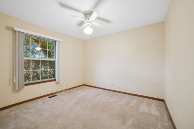 Welcome to this inviting 3-bedroom, 2-bath ranch offering on Streamwood Oaks Golf Club in Illinois - for sale on GolfHomes.com, golf home, golf lot